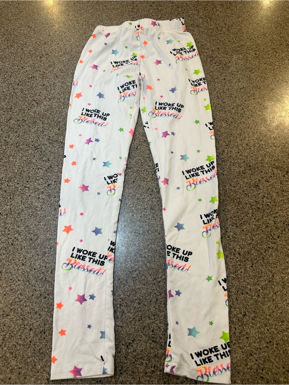 Place White Pajama Bottoms with Multicolor Stars and Text